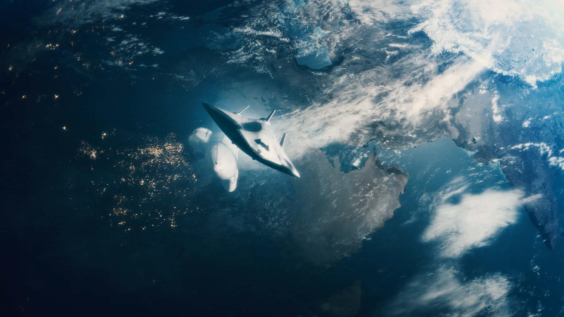一艘太空船飛越地球上空 壁紙