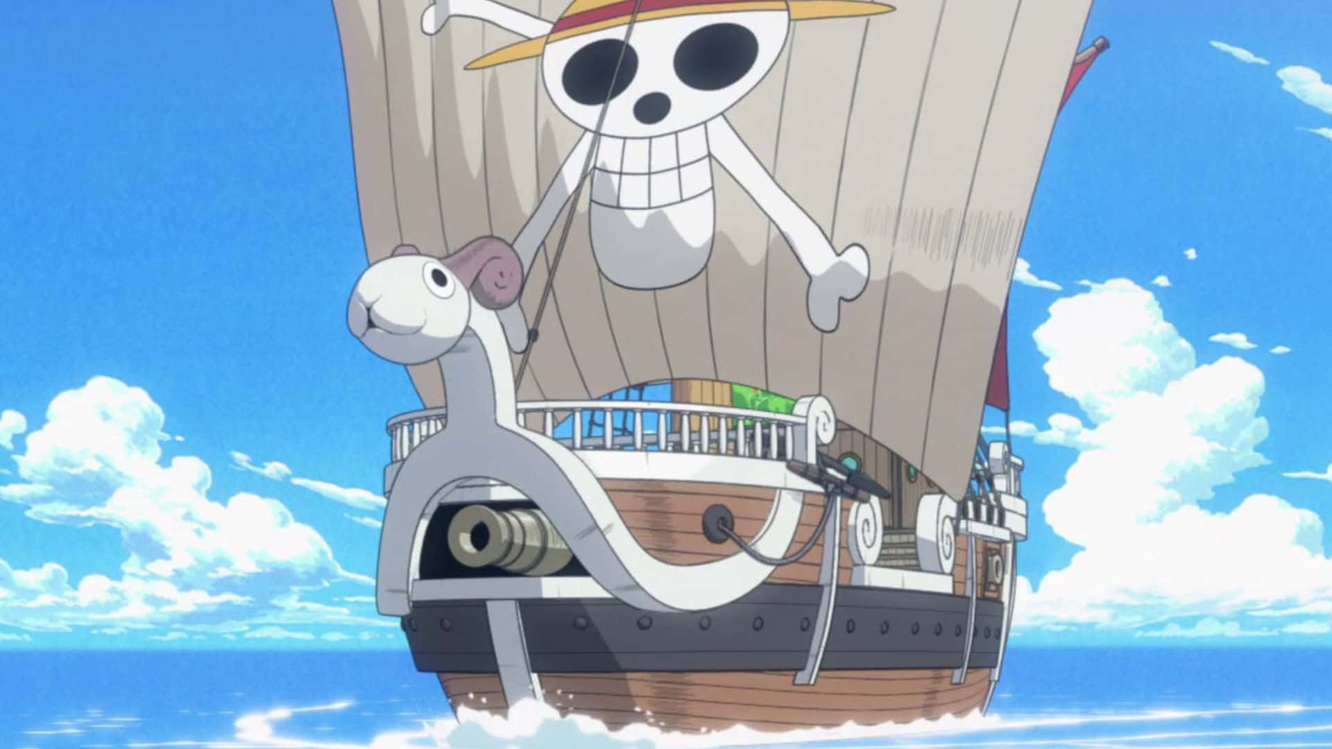 Going Merry 桌布 壁紙 — 一艘掛著骷髏旗的海盜船在晴朗的天空下，伴隨著蓬鬆的白雲，航行在明亮的藍色海洋上。