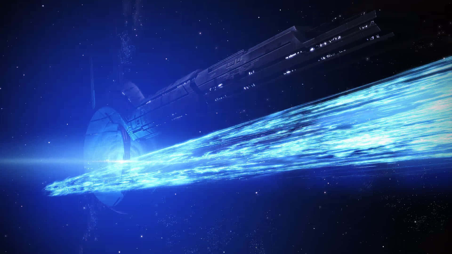 Mass Effect Legendary Edition 桌布 壁紙 — 一艘未來風格的太空船在深空中疾馳，在星空中留下一道耀眼的藍色能量軌跡。