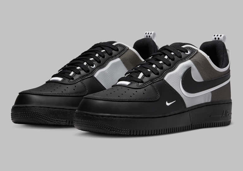 黑色和銀色穿孔設計的Nike Air Force 1運動鞋。