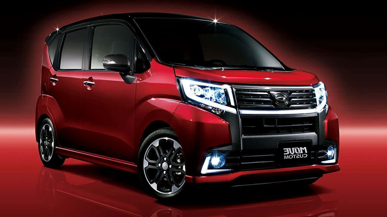 Daihatsu 桌布 壁紙 — 一輛帶有黑色飾邊和發光頭燈的亮紅色定制小型貨車，在紅色漸變工作室背景的襯托下顯得格外引人注目。
