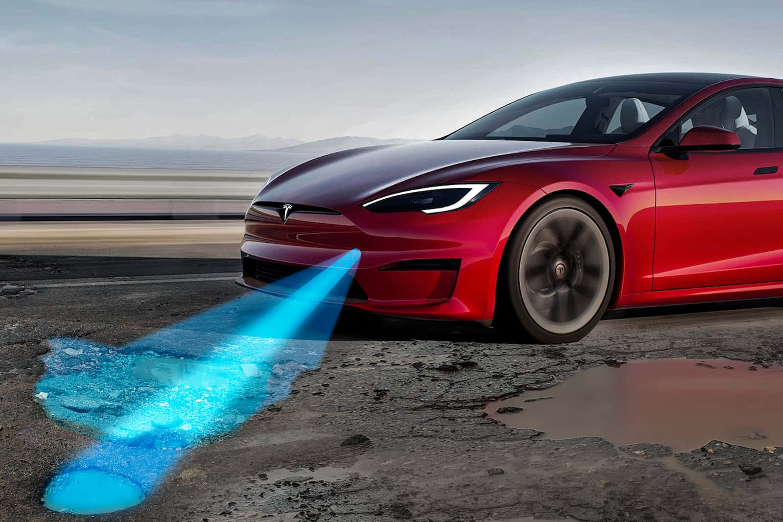 tesla 桌布 壁紙 — 一輛時尚的紅色Tesla Model S在潮濕的道路上疾馳，前方射出發光的藍色能量軌跡。