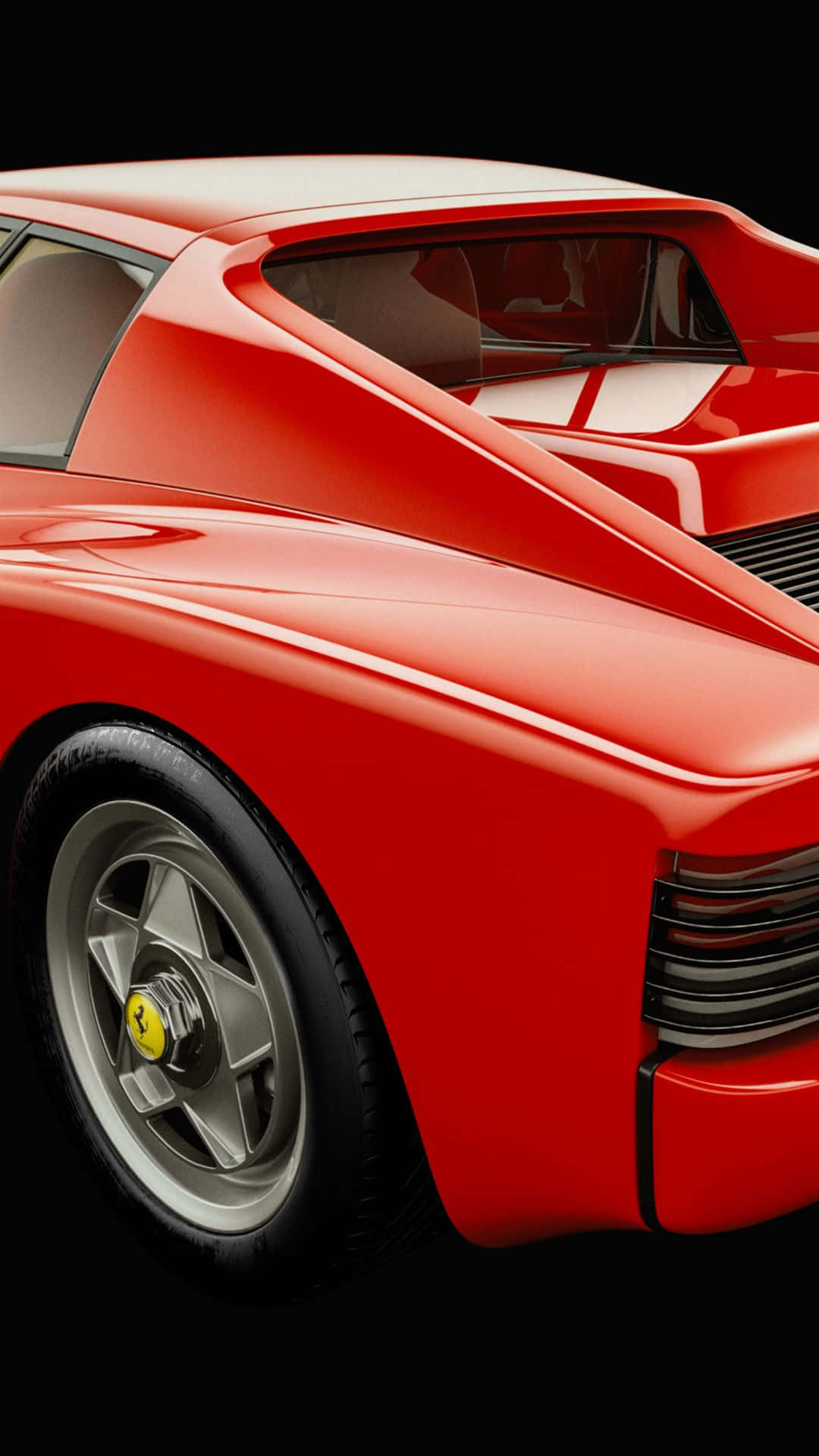 Ferrari Testarossa 桌布 壁紙 — 一輛時尚的紅色法拉利跑車，配備銀色輪圈和黃色標誌，在黑色背景的攝影棚拍攝中展示。