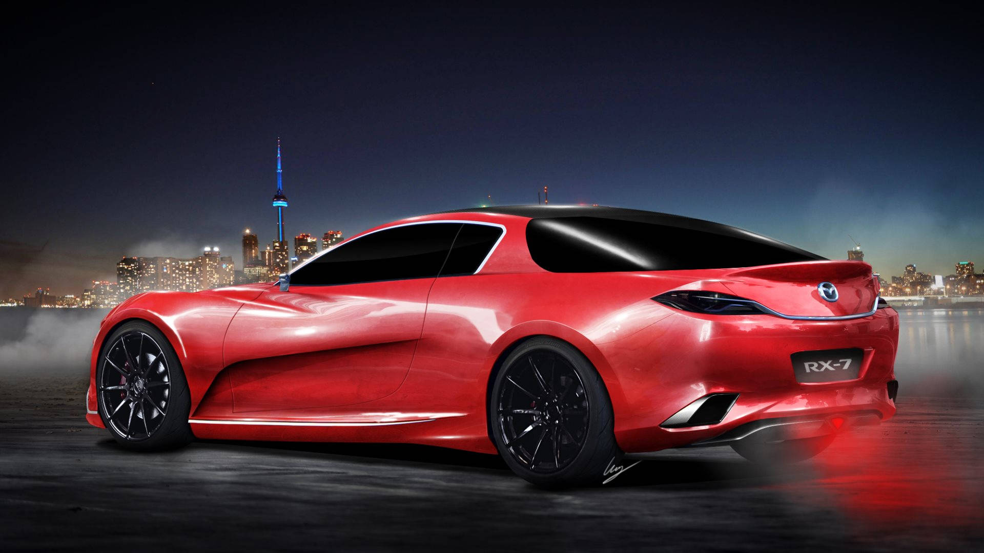 Mazda 桌布 壁紙 — 一輛流線型紅色Mazda RX-7概念車在夜間滑行，背景是城市燈光和發光的塔樓。