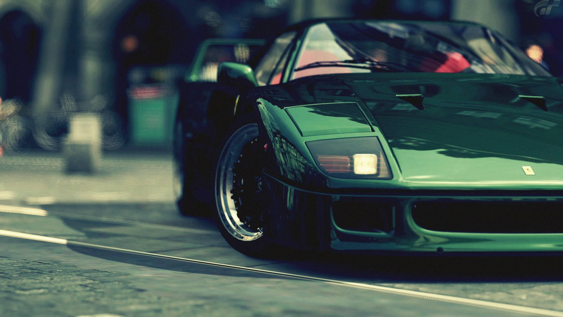 Sports Car 桌布 壁紙 — 一輛流線型綠色法拉利F40停在城市街道上，景深淺，燈光如電影般。