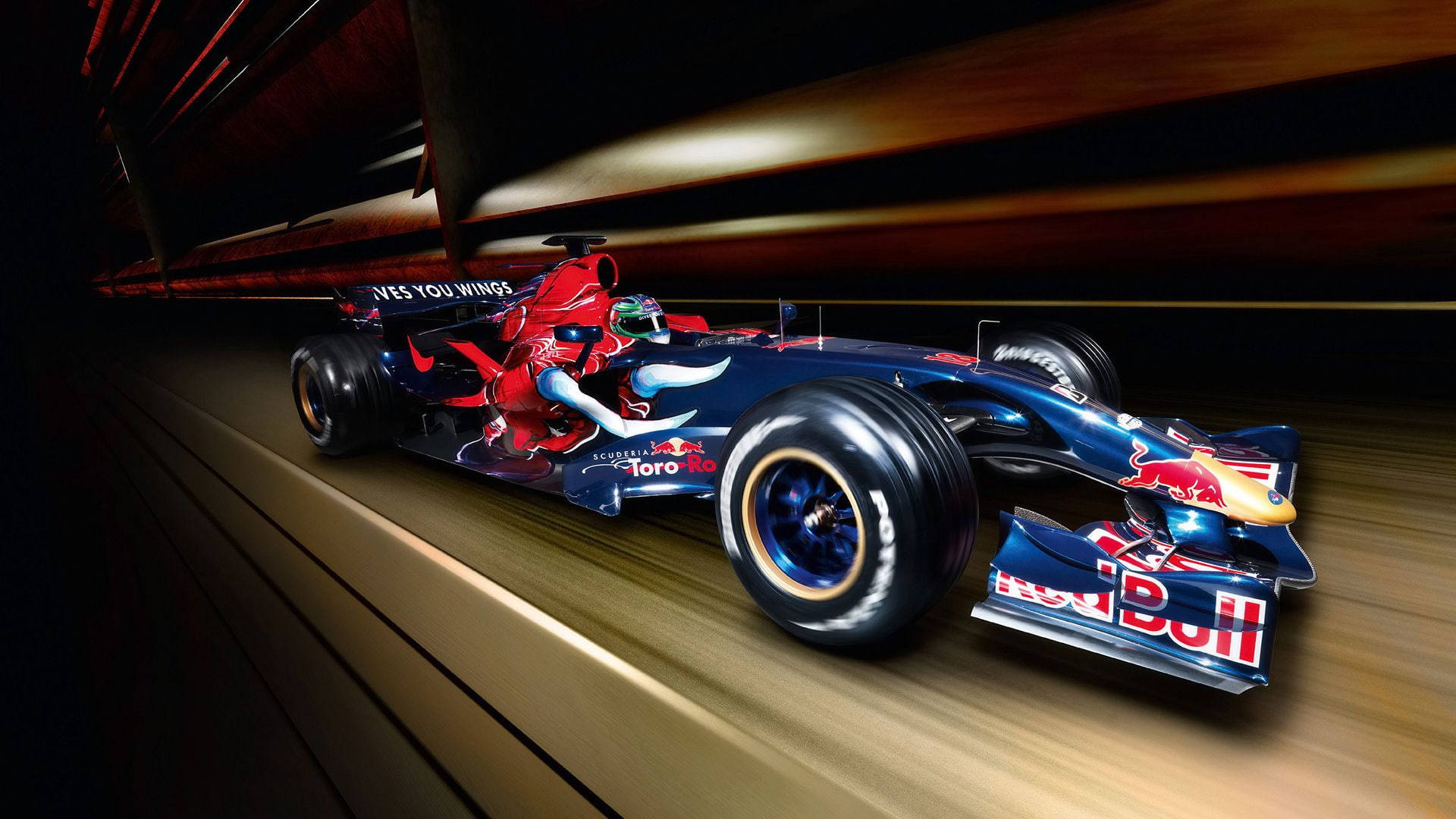 F1 Scuderia Toro Rosso STR2 2007 壁紙 — 一輛紅牛一級方程式賽車高速穿越隧道，動態模糊強調高速和流線型空氣動力學設計。