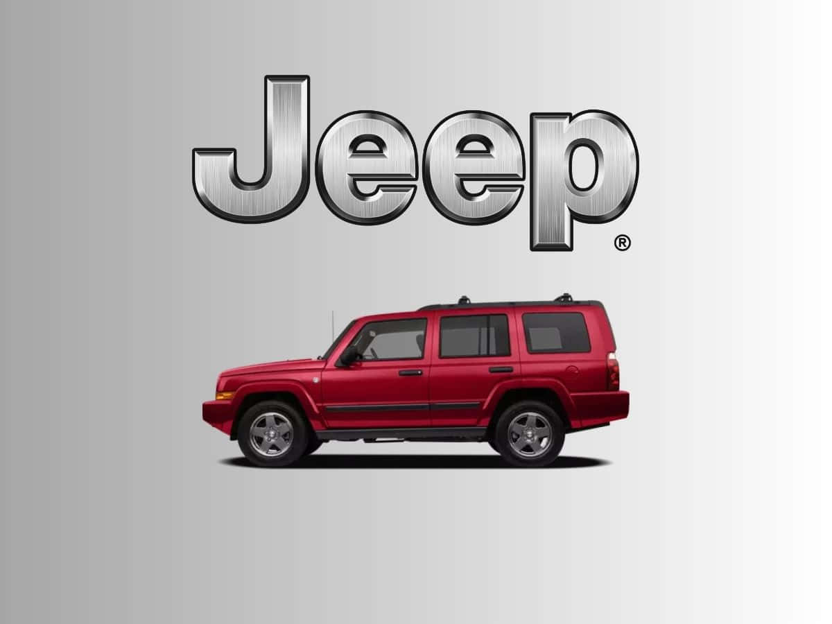 Jeep Commander 桌布 壁紙 — 一輛紅色Jeep Wrangler SUV在側面展示，位於一個大型金屬Jeep標誌下方，背景為純灰色。