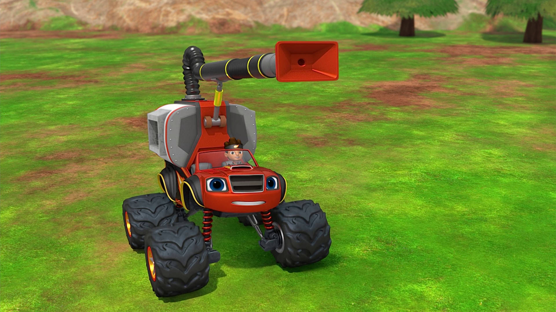 Blaze And The Monster Machines Vacuum 壁紙 — 一輛紅色動畫怪獸卡車，有大眼睛和角，駛過一片有樹木背景的草地。