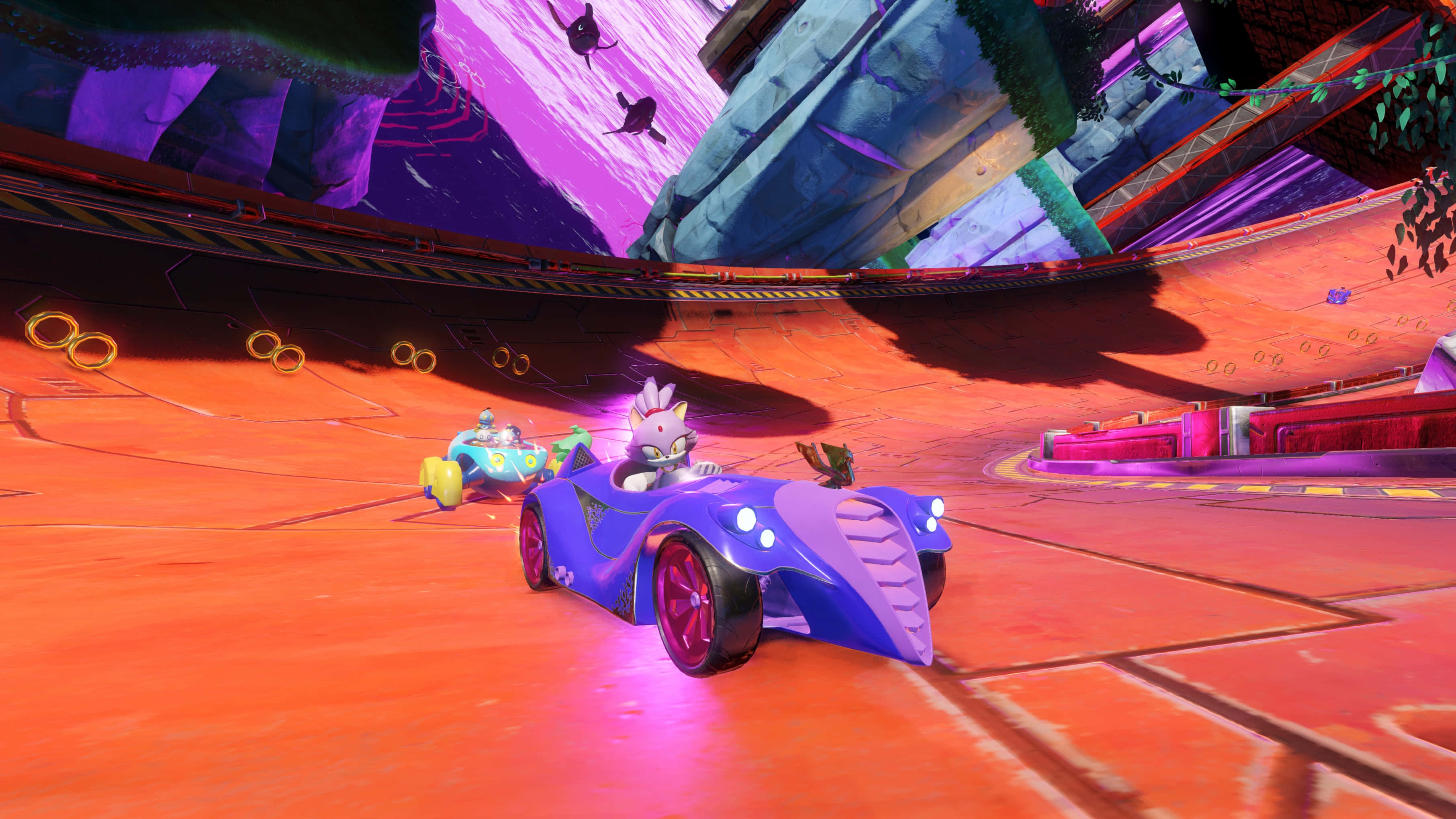 Sonic Battle Racers 桌布 壁紙 — 一輛紫色賽車，狐狸司機在紫色天空下，有浮動環的鮮豔橙色賽道上飛馳。