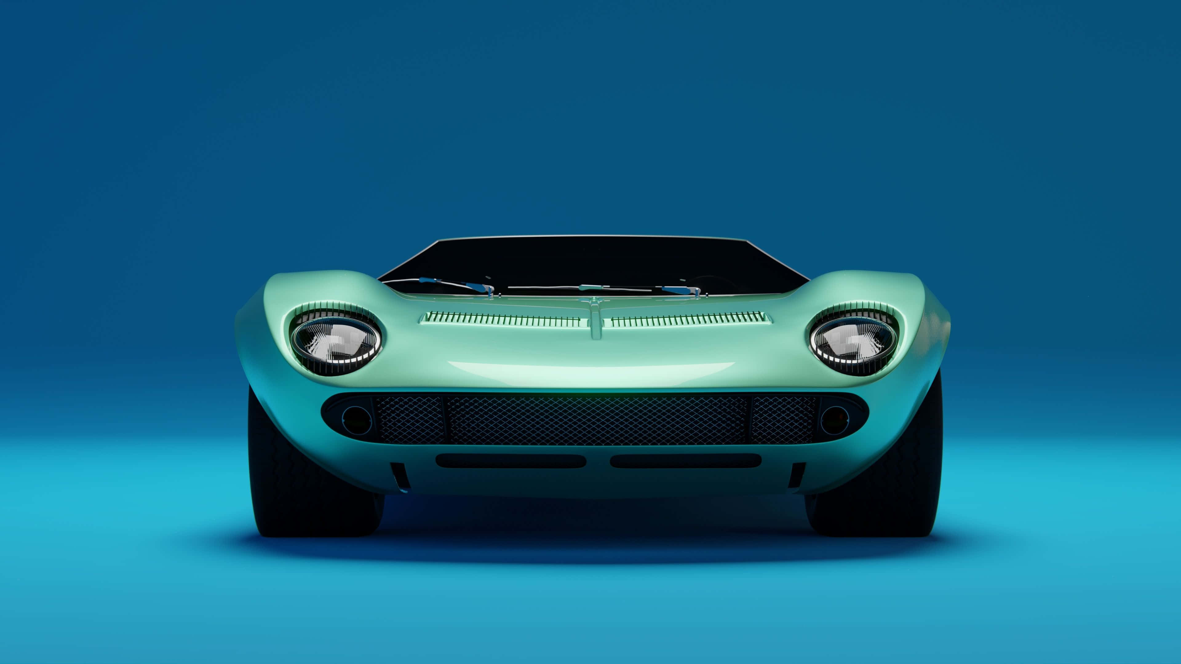 Lamborghini Miura 桌布 壁紙 — 一輛薄荷綠色的經典跑車正面朝向漸變藍色工作室背景。