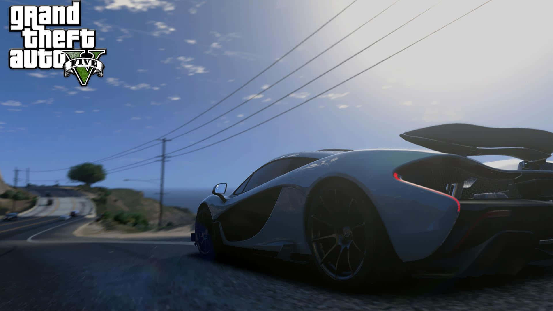 一輛藍色汽車在《Grand Theft Auto》中沿路行駛 壁紙