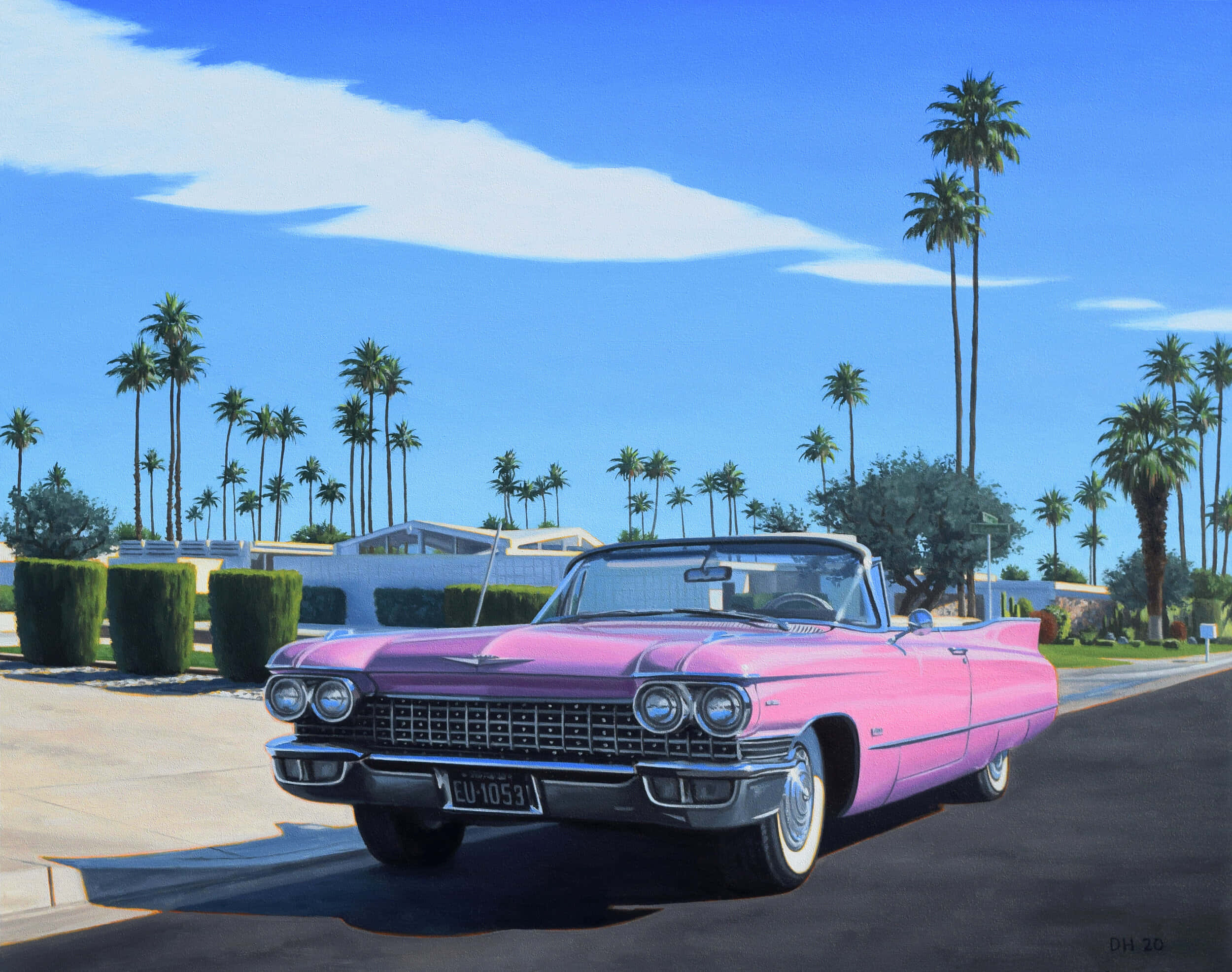Pink Cadillac 桌布 壁紙 — 一輛鮮粉紅色的1959年凱迪拉克敞篷車停在一條陽光普照的街道上，街道兩旁種滿棕櫚樹和中世紀房屋。