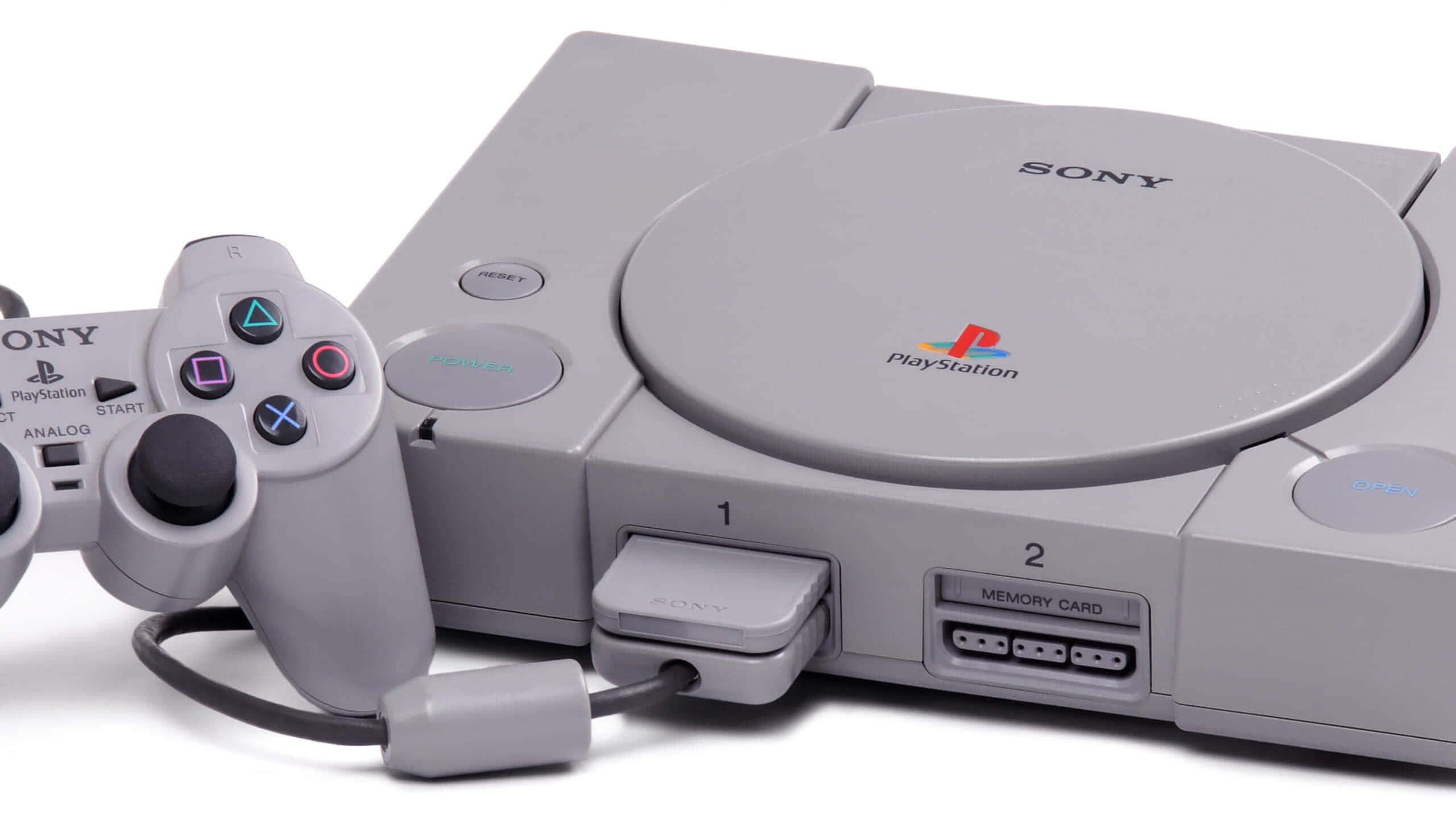 一部Sony經典主機連同兩個手掣 壁紙