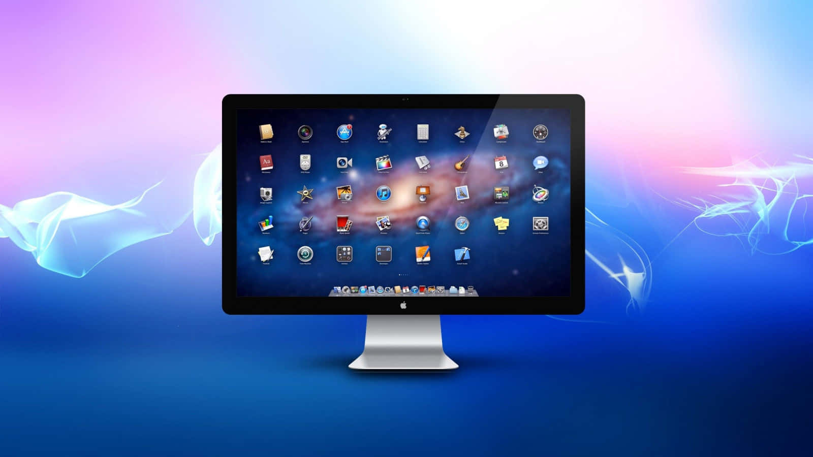 Multimedia 桌布 壁紙 — 一部時尚的 iMac 電腦顯示出充滿活力的桌面，帶有發光的應用程式圖標，背景是宇宙，並由空靈的藍色和紫色光漩渦框住。