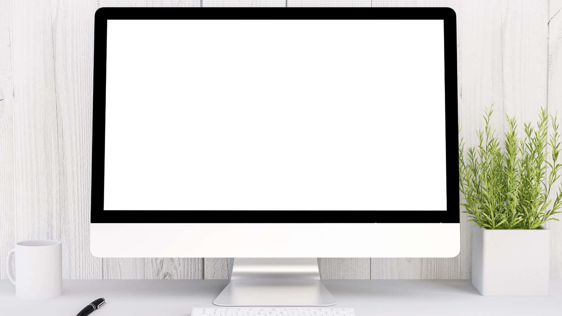 Computer Screen 桌布 壁紙 — 一部時尚的白色一體式桌上電腦放在簡約的書桌上，旁邊有一盆植物和一個杯子。