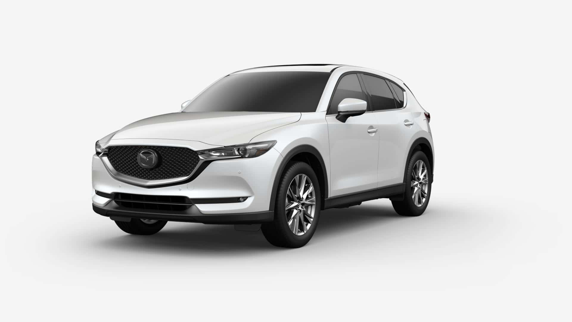 Mazda Cx-30 桌布 壁紙 — 一部時尚的白色萬事達CX-5 SUV在乾淨的攝影棚環境中展示，光線柔和，陰影細膩。