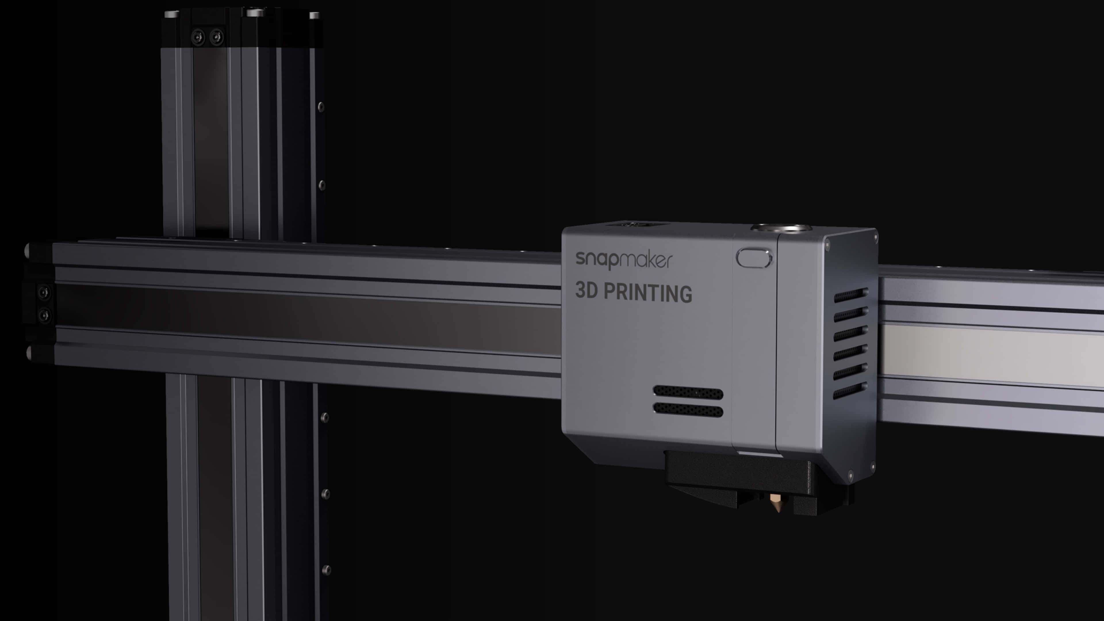 3d Printer 桌布 壁紙 — 一部時尚的銀色 Snapmaker 3D 打印機，採用極簡設計，立在黑色背景前。