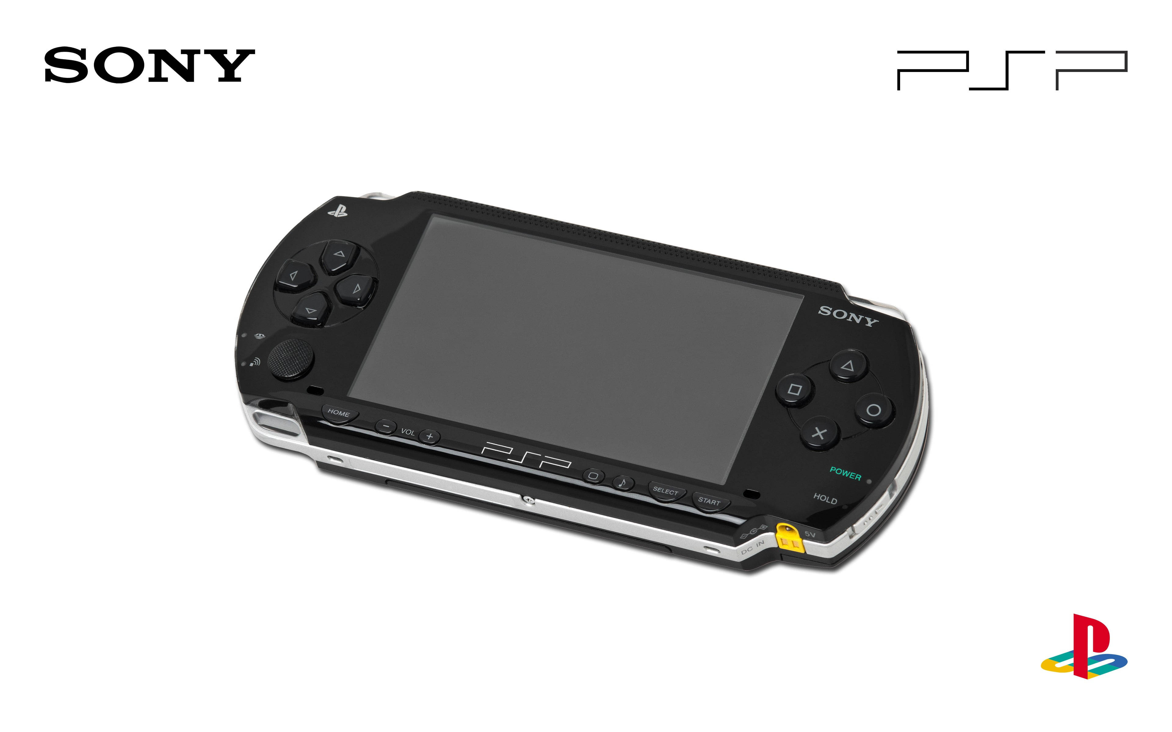 黑色 Sony PSP 手提遊戲裝置，帶有銀色點綴和標誌。 — PlayStation GIF 壁紙