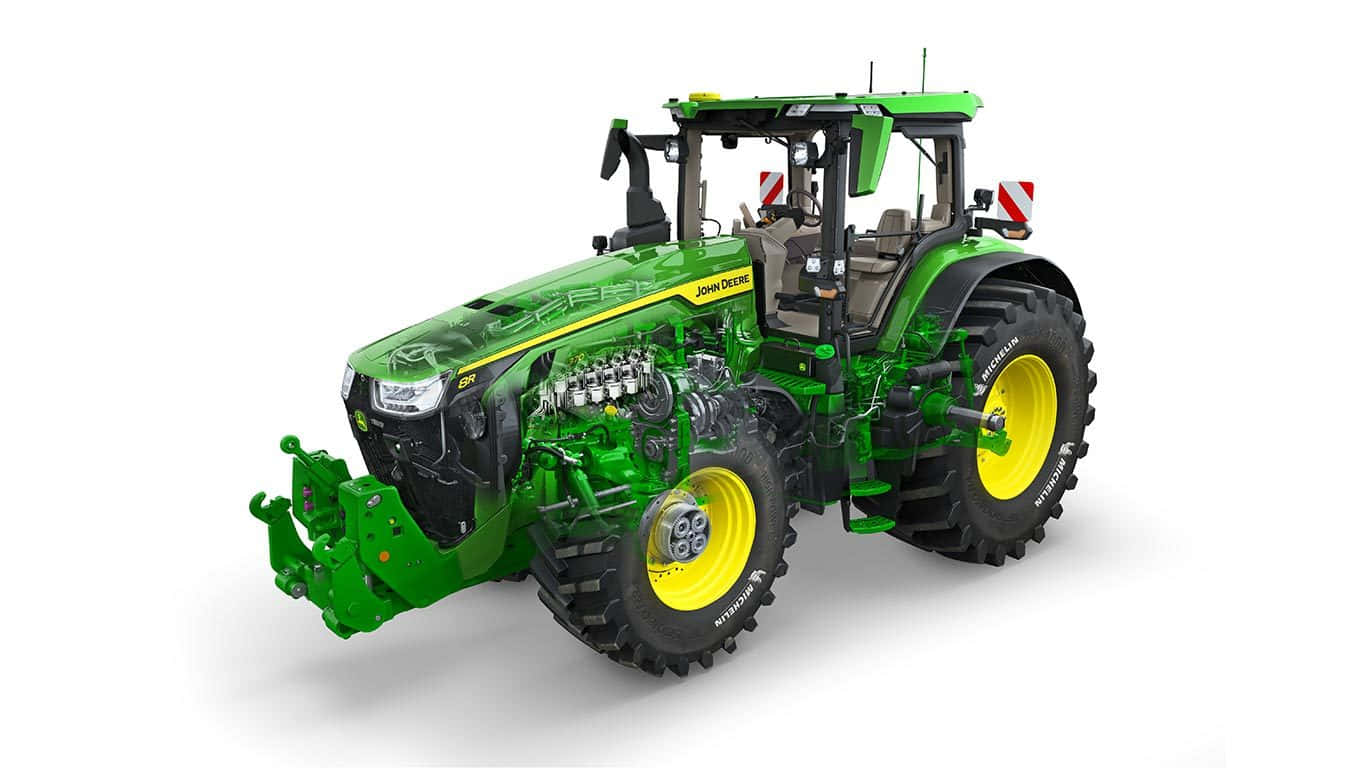 John Deere 桌布 壁紙 — 一部綠色和黃色的約翰迪爾拖拉機，帶有透明引擎缸體，展示在潔白背景上。