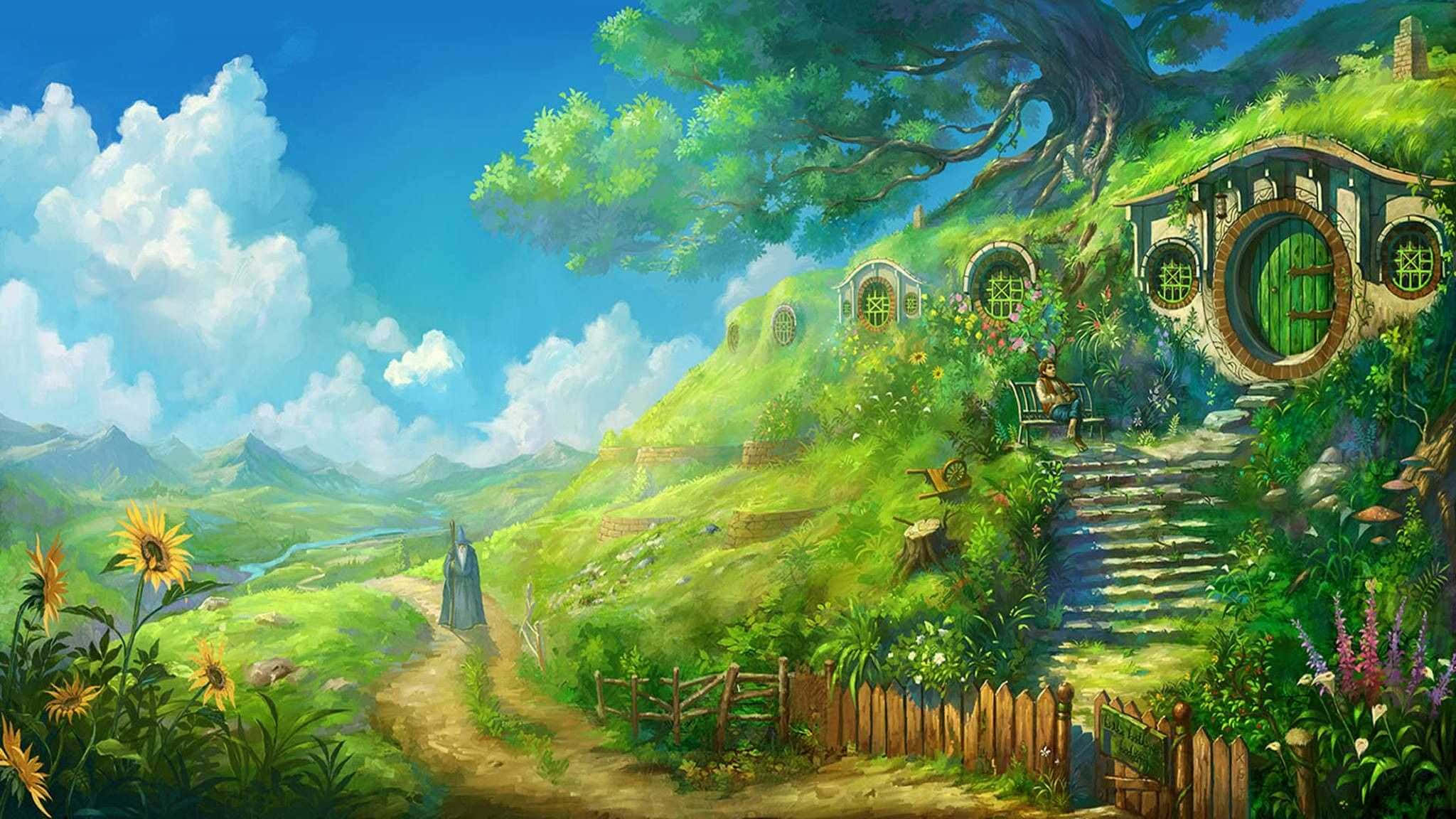 吉卜力 桌布 壁紙 — 一間奇幻的哈比屋，坐落在茂密的綠色山坡上，上方是晴朗的藍天和蓬鬆的白雲。