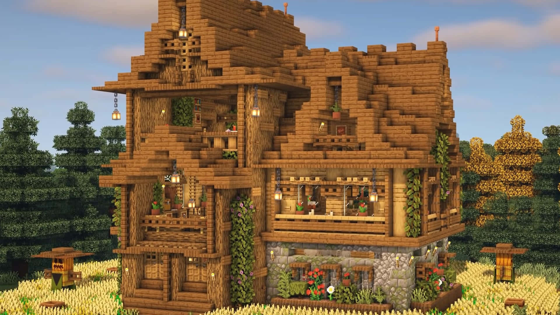 Minecraft Pixel Art 桌布 壁紙 — 一間舒適的像素風格木屋，配有石頭地基和懸掛燈籠，坐落在晴朗藍天下被樹木環繞的草地上。
