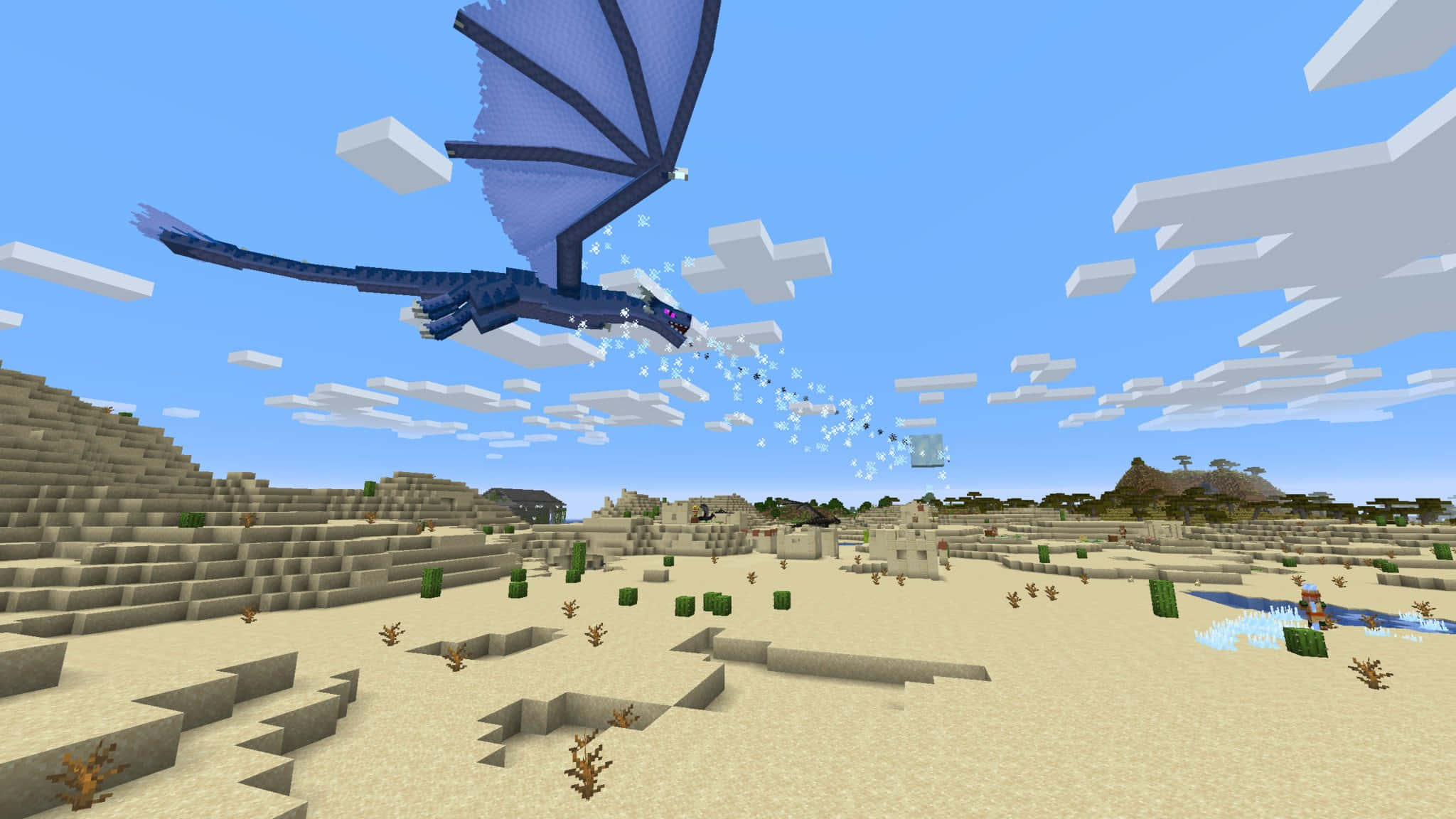Minecraft Mods 桌布 壁紙 — 一隻像素化嘅藍色龍喺Minecraft嘅沙漠生物群落上空翱翔，向遠處嘅玩家噴出冰粒。