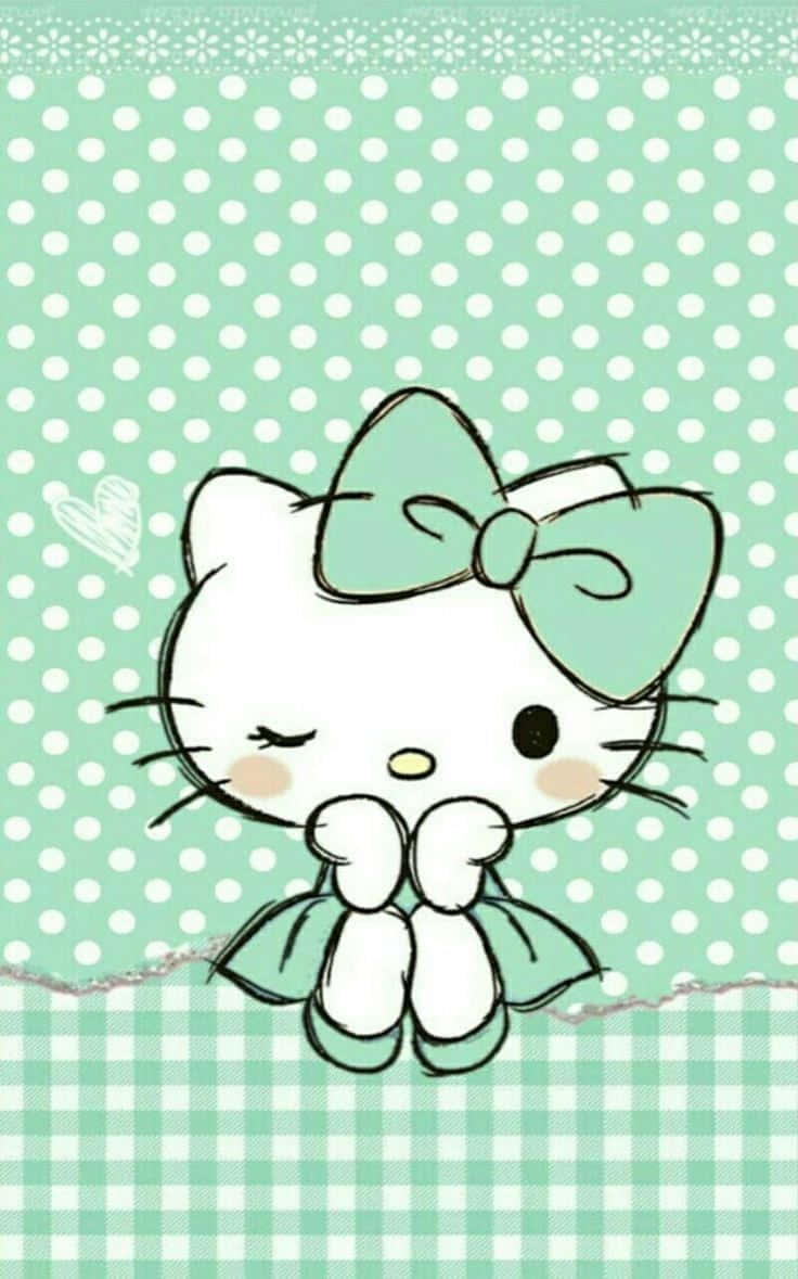 Kawaii Hello Kitty 桌布 壁紙 — 一隻可愛的卡通貓咪，戴著薄荷綠蝴蝶結和穿著連衣裙，從破損的圓點和格紋背景後探出頭來。