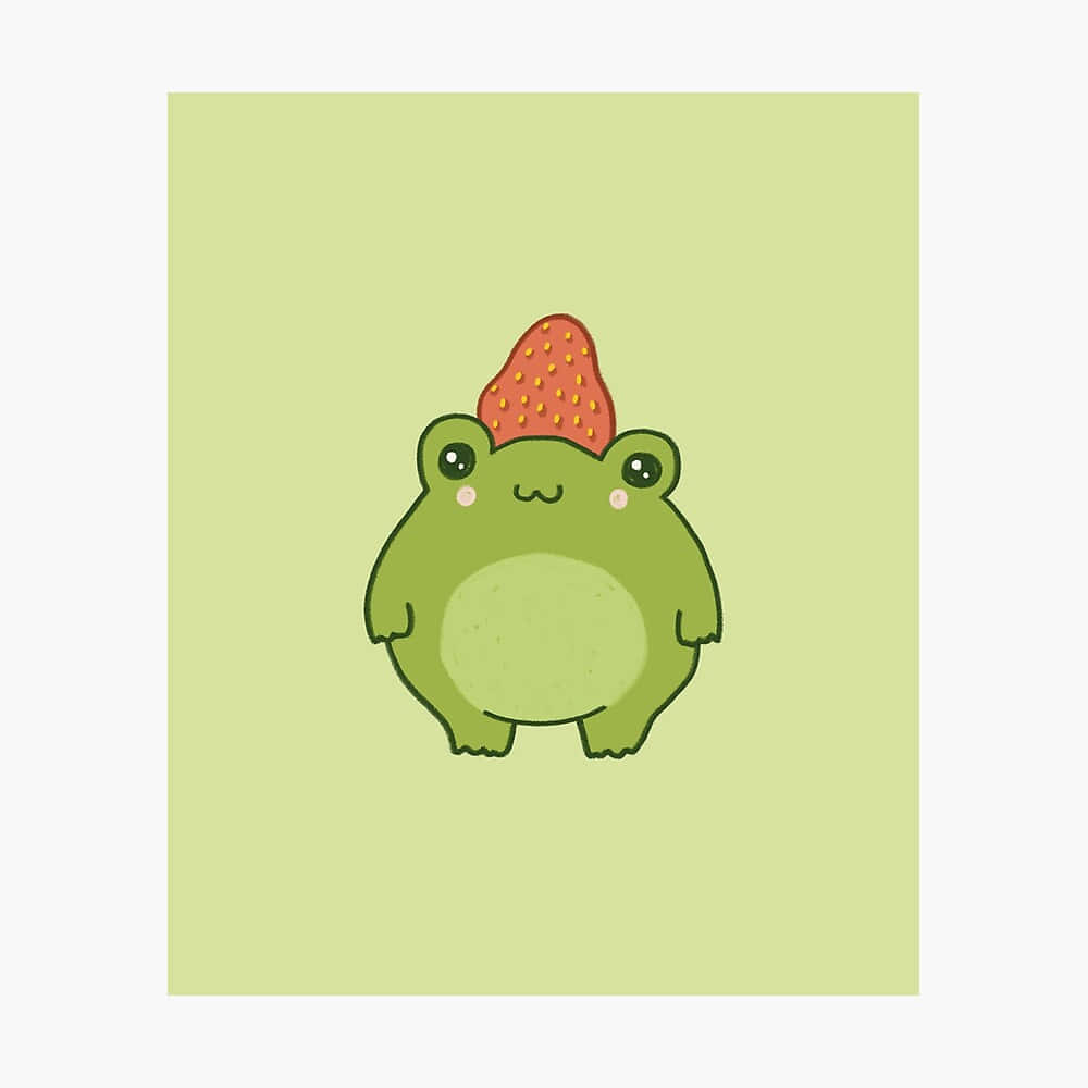 Cute Frog 桌布 壁紙 — 一隻可愛的綠色卡通青蛙，戴著紅色草莓帽，背景是柔和的薄荷色。