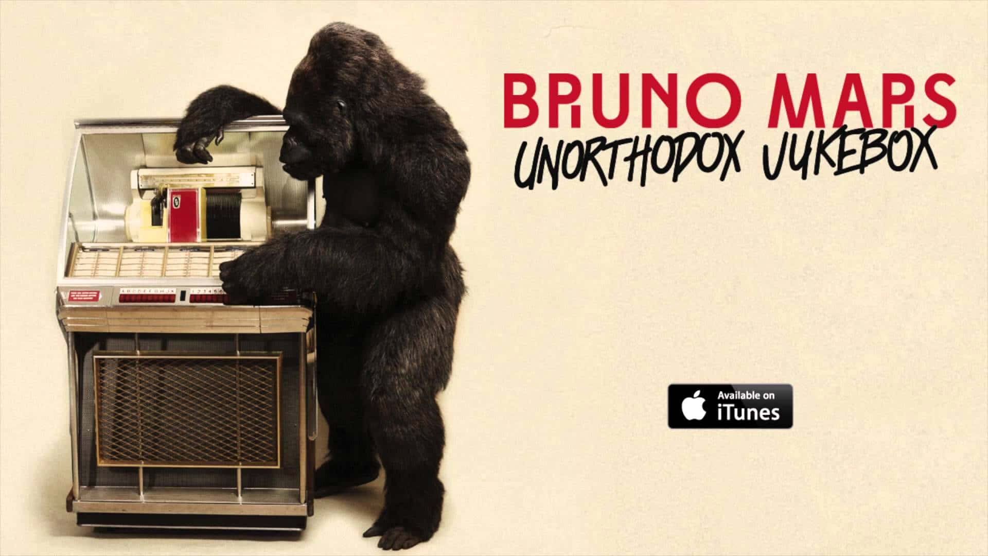 Bruno Mars《Unorthodox Jukebox》 壁紙 — 一隻大猩猩站在米色背景上，旁邊有一部帶有紅色和奶油色裝飾的復古點唱機。