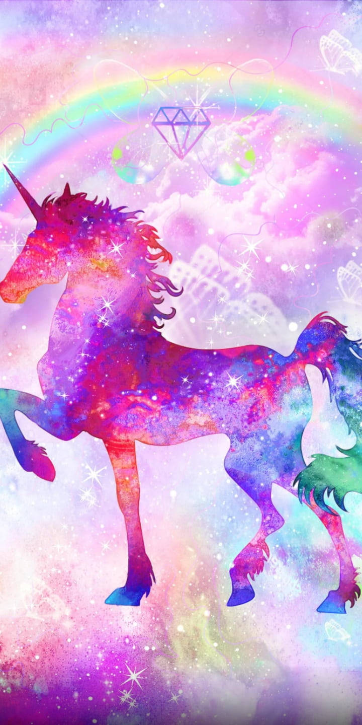 閃粉 桌布 壁紙 — 一隻宇宙獨角獸在紫色、粉紅色和藍色的閃爍星系中，於彩虹下奔馳。