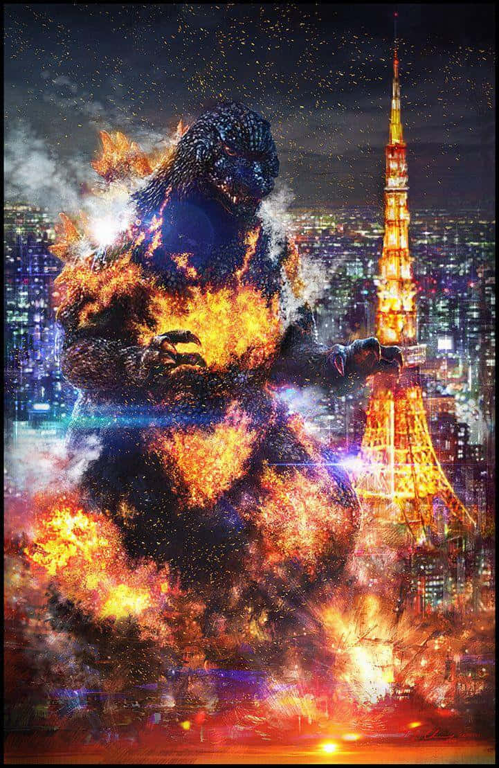 Burning Godzilla 桌布 壁紙 — 一隻巨大的哥斯拉被火焰爆炸吞噬，聳立在夜晚燃燒的東京天際線上，附近有亮燈的東京鐵塔。