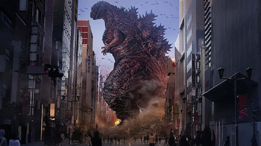 Godzilla City Destruction 桌布 壁紙 — 一隻巨大的哥斯拉踏過城市街道，壓碎建築物，碎片飛揚，驚慌的人群在下方逃竄。