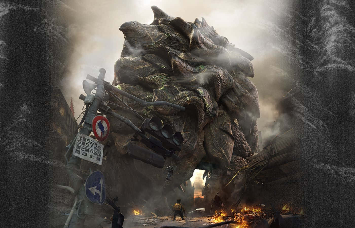 Gamera 桌布 壁紙 — 一隻巨大的怪物壓碎城市街道，火焰爆發，碎片在煙霧彌漫的天空下飛舞。