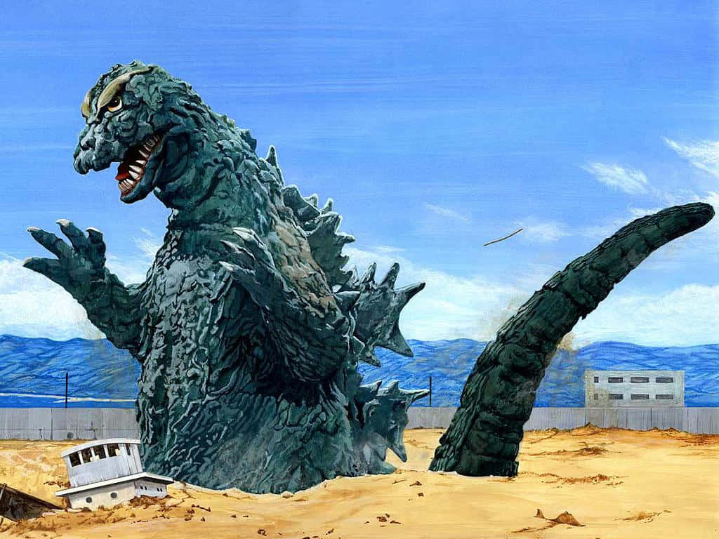 Godzilla 1954 桌布 壁紙 — 一隻巨大的綠色哥斯拉從沙地中出現，附近有一艘破船，背景是山脈和藍天。