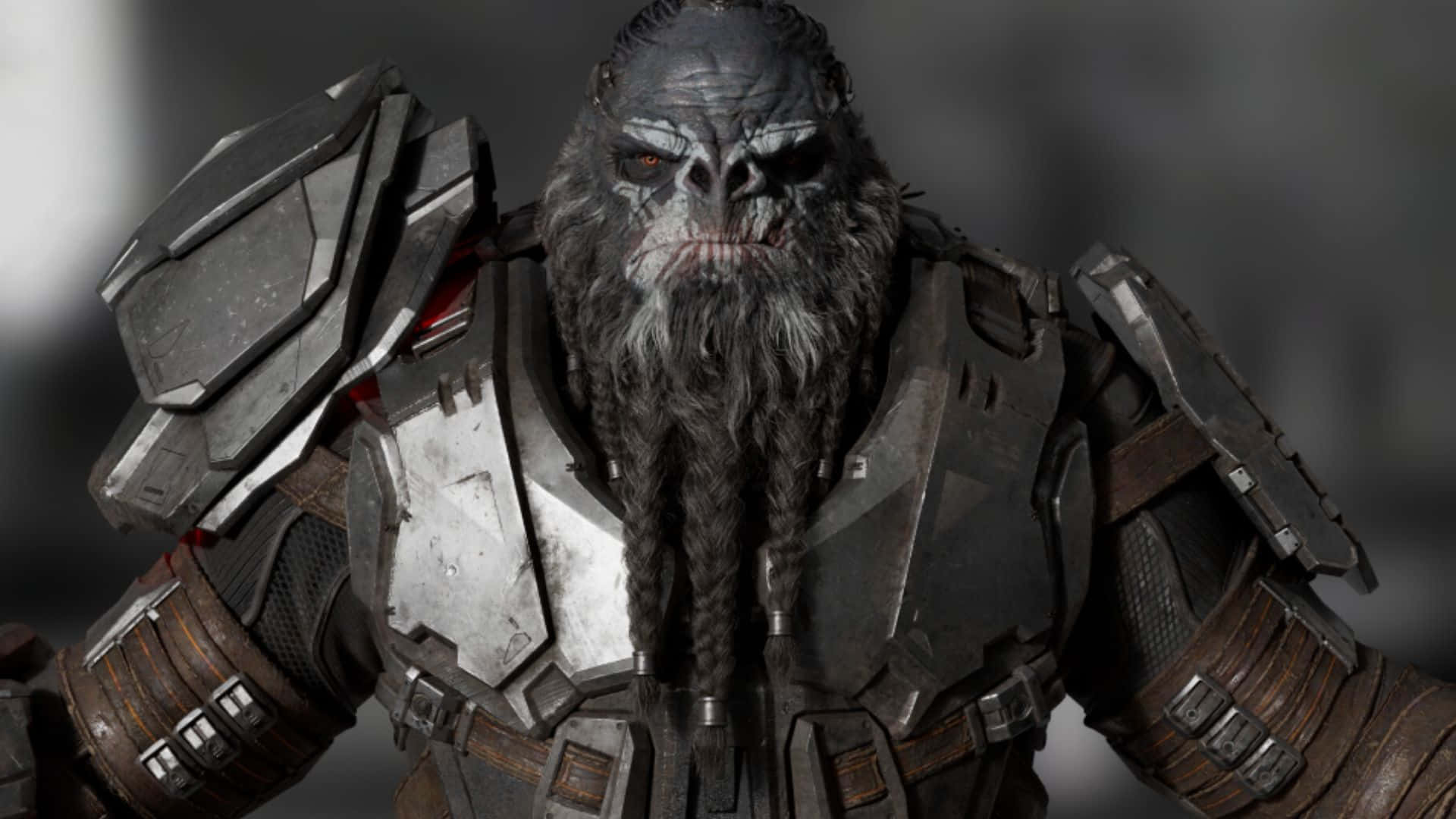 Atriox 桌布 壁紙 — 一隻帶有辮子鬍鬚和發光眼睛的威脅性裝甲大猩猩，在深灰色背景下強烈凝視。