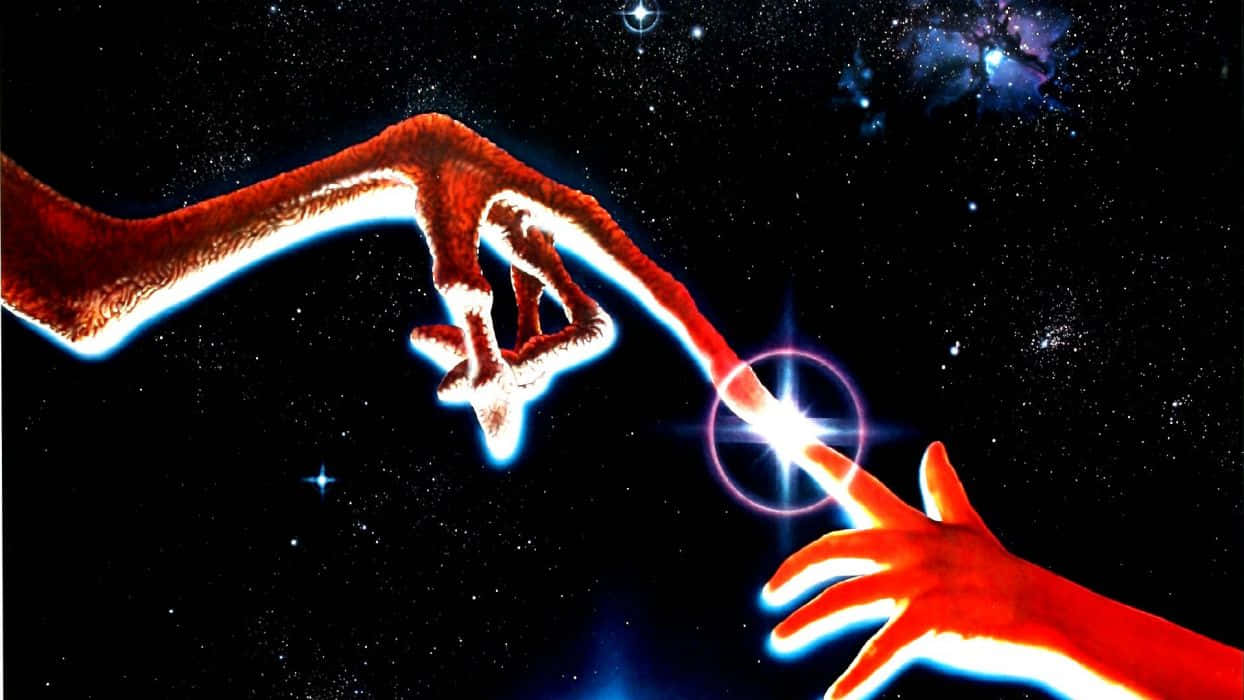 兩隻發光的紅色手穿過太空觸碰一顆明亮的星星。