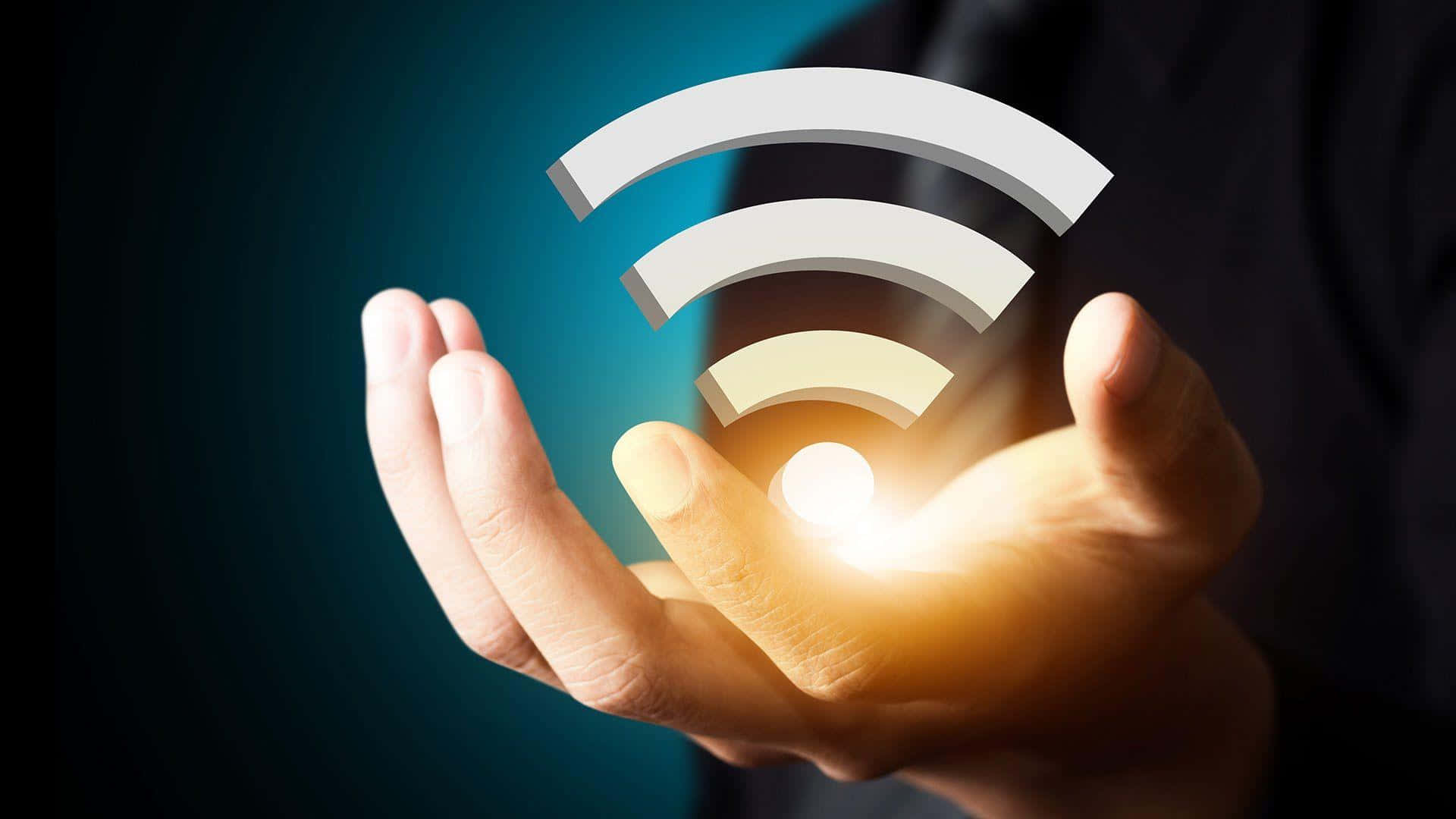 wifi 桌布 壁紙 — 一隻手托住一個發光的WiFi標誌，背景為深藍色漸變。
