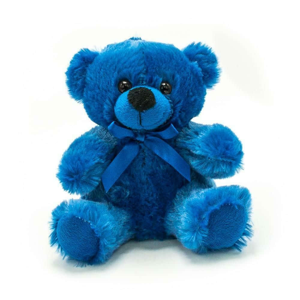 Teddy Bear 桌布 壁紙 — 一隻柔軟的藍色泰迪熊，配以相配的蝴蝶結，直立在潔白的背景前。