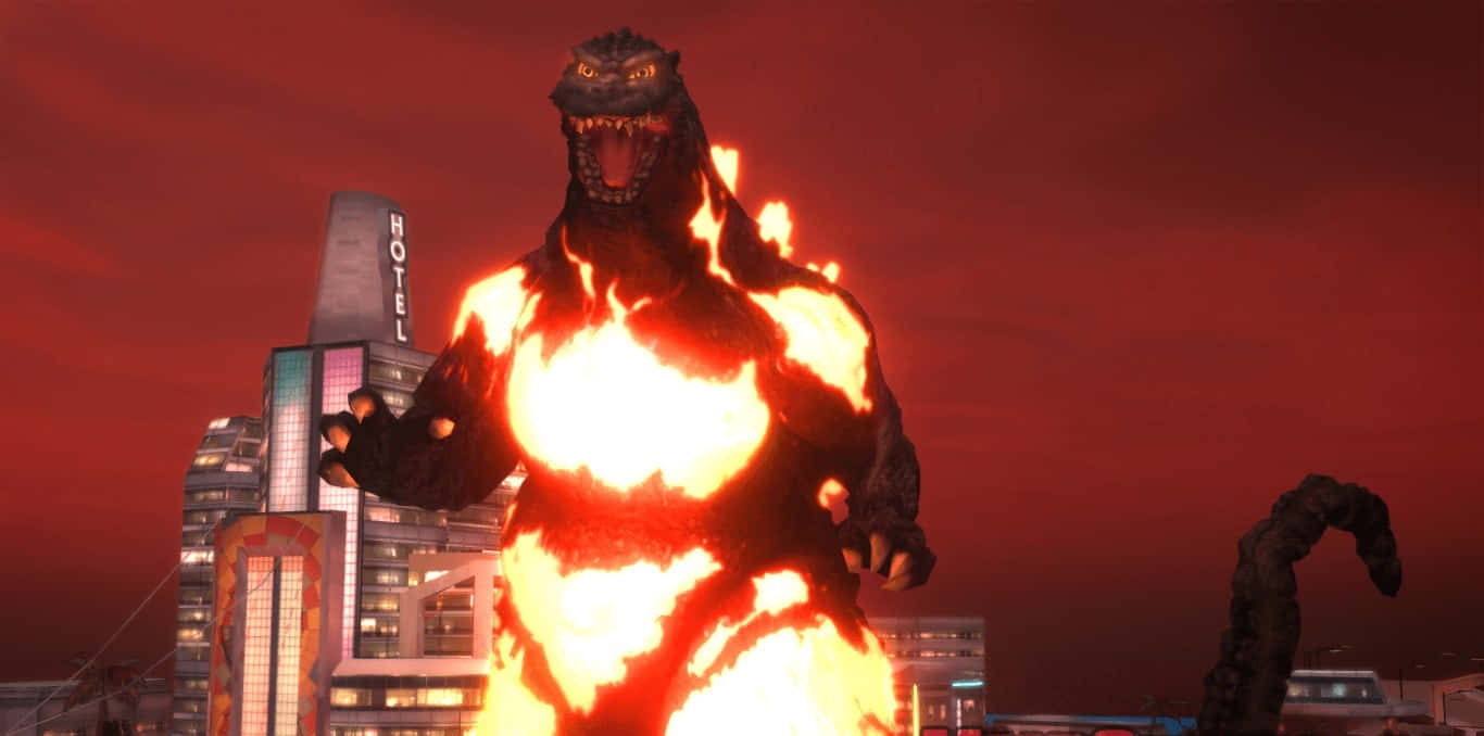 Burning Godzilla 桌布 壁紙 — 一隻火熱的哥斯拉在血紅色的天空下，於燃燒的城市景觀中咆哮，可見酒店塔樓。
