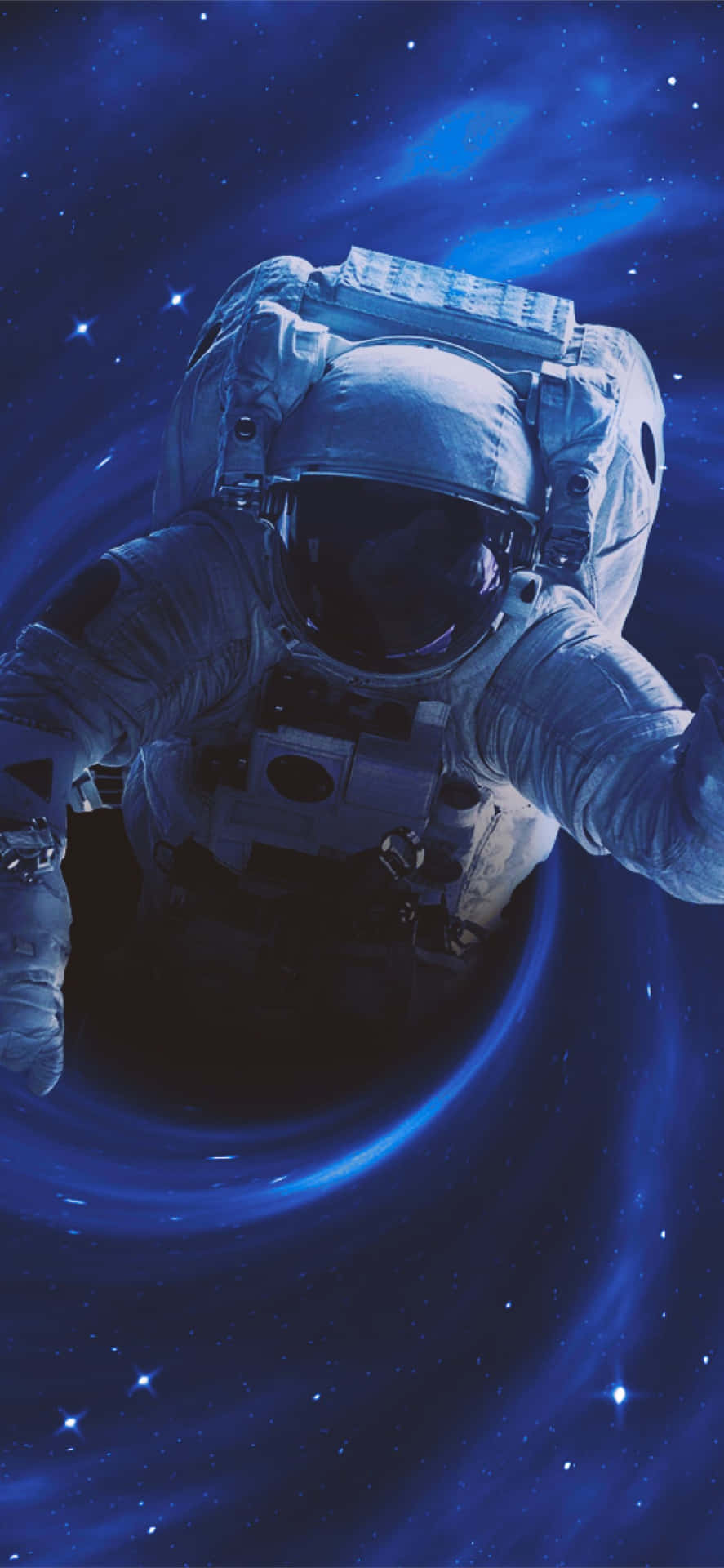 太空人在充滿星星的藍色星雲中漂流