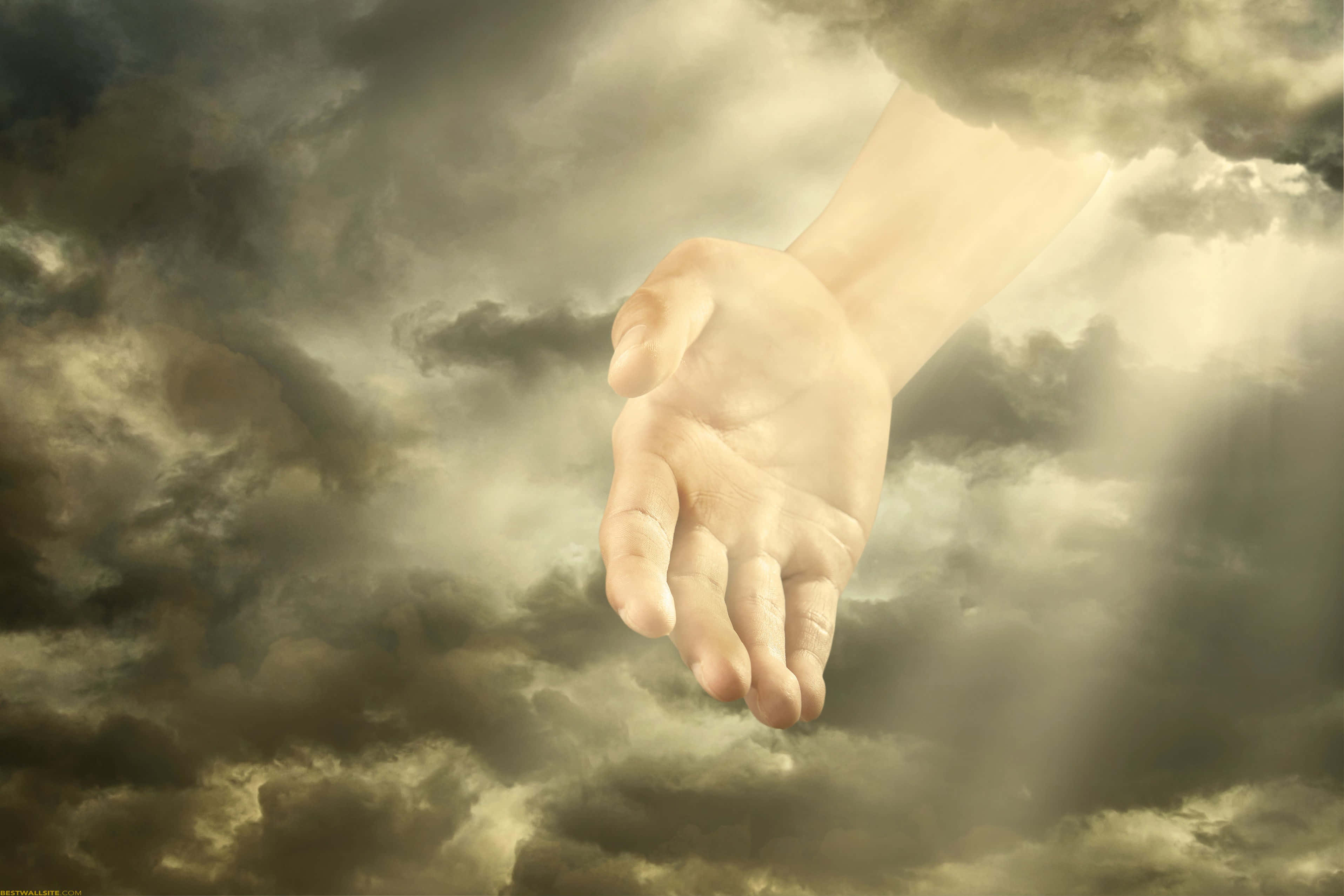 hands 桌布 壁紙 — 一隻神聖的手穿過暴風雲層伸下來，光線穿透陰暗。
