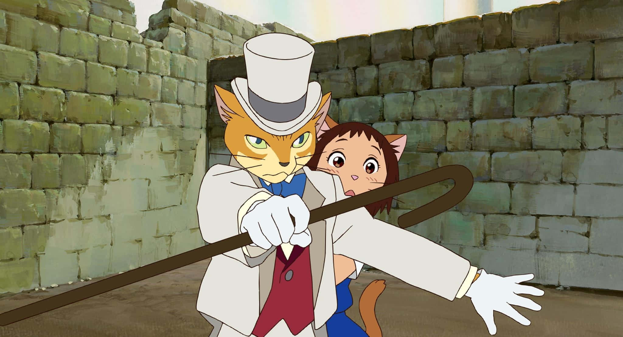 the cat returns 桌布 壁紙 — 一隻穿著得體、戴著高帽和拿著手杖的擬人化貓咪，在石頭廢墟環境中保護性地站在一個驚訝的女孩旁邊。