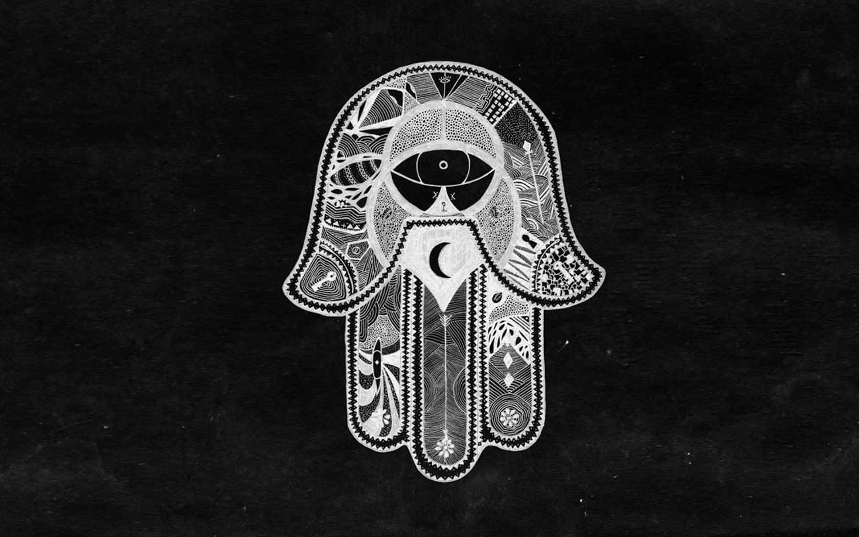 Hamsa 桌布 壁紙 — 一隻細節精緻的白色漢莎手，帶有眼睛和彎月，背景為帶紋理的黑色。