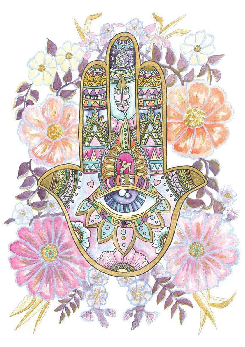 Hamsa 桌布 壁紙 — 一隻色彩繽紛、華麗的哈姆薩之手，中心有一隻眼睛，周圍環繞著盛開的粉紅色和蜜桃色花朵。