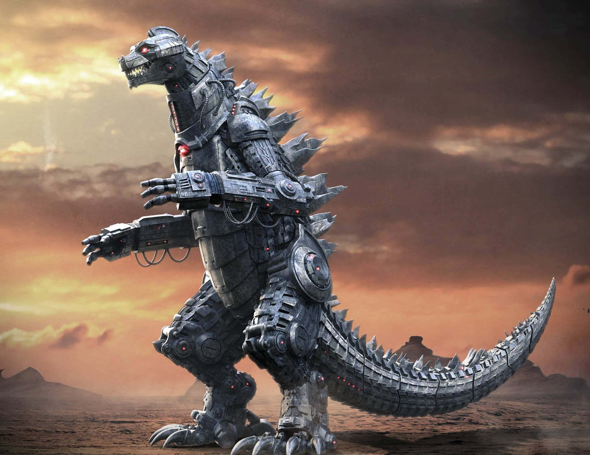 mechagodzilla 桌布 壁紙 — 一隻高聳的機械哥斯拉站在荒涼的沙漠中，背景是火紅的夕陽天空，雙眼發出紅光。