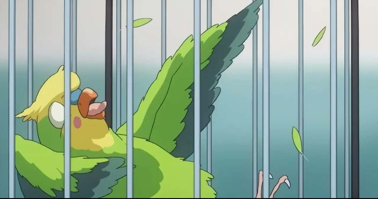 Toradora Inko 桌布 壁紙 — 一隻鮮綠色、頭部有黃色羽毛的鸚鵡在金屬籠子裡拍動翅膀，樹葉飄過籠條之間。