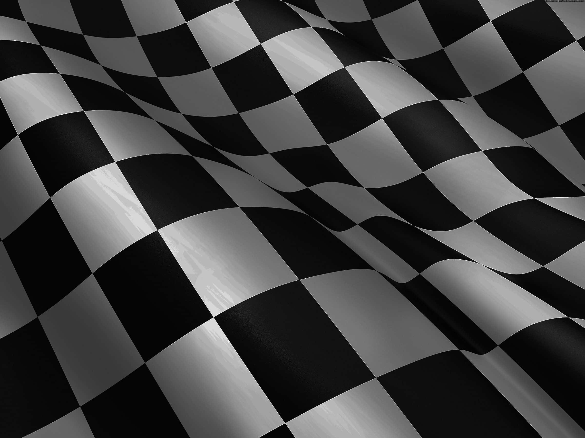Checkered Flag 桌布 壁紙 — 一面動感的黑白格仔旗在明亮光線下飄揚，帶有戲劇性的摺痕和高光。