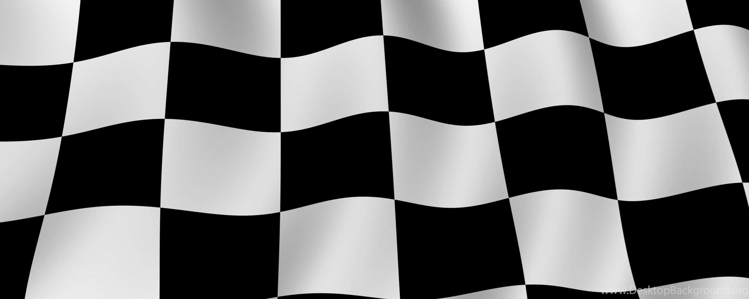 Checkered Flag 桌布 壁紙 — 一面動感的黑白格仔旗在純色背景上飄揚，帶有清晰的摺痕和光澤亮點。