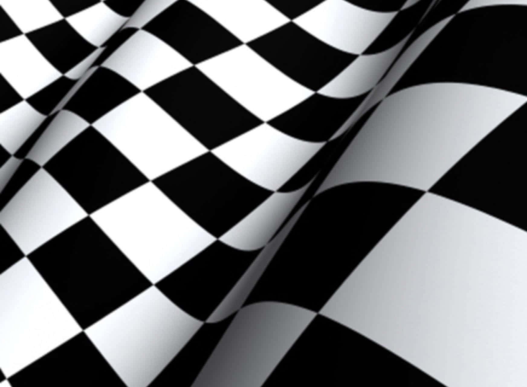 Checkered Flag 桌布 壁紙 — 一面動感的黑白格仔賽車旗隨風飄揚，帶有清晰的摺痕和強烈對比。