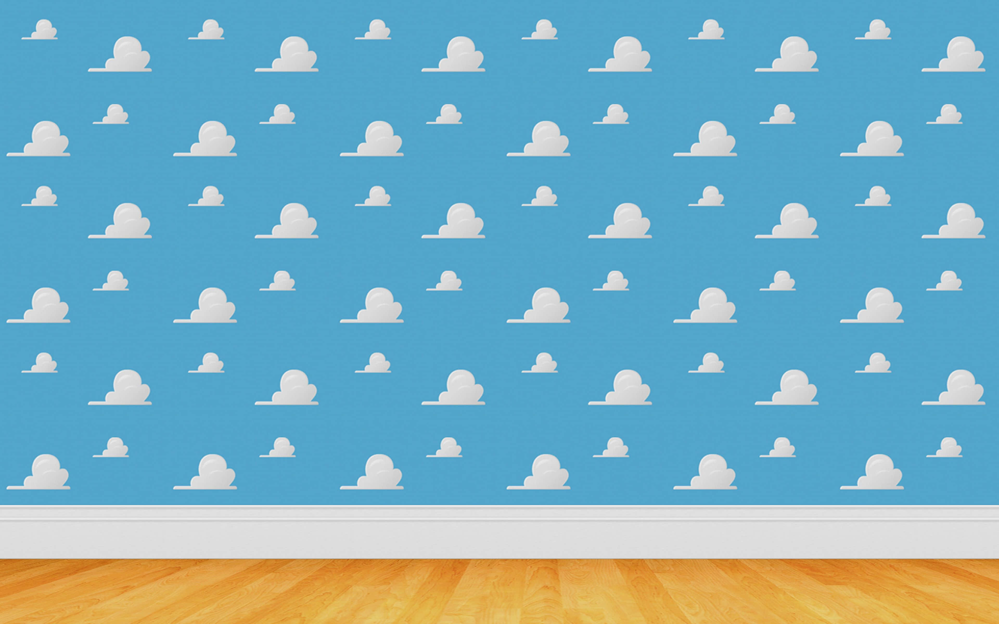 Toy Story Cloud 桌布 壁紙 — 一面藍色牆壁覆蓋著白色雲朵貼紙，與帶有白色踢腳線的溫暖木地板相遇。